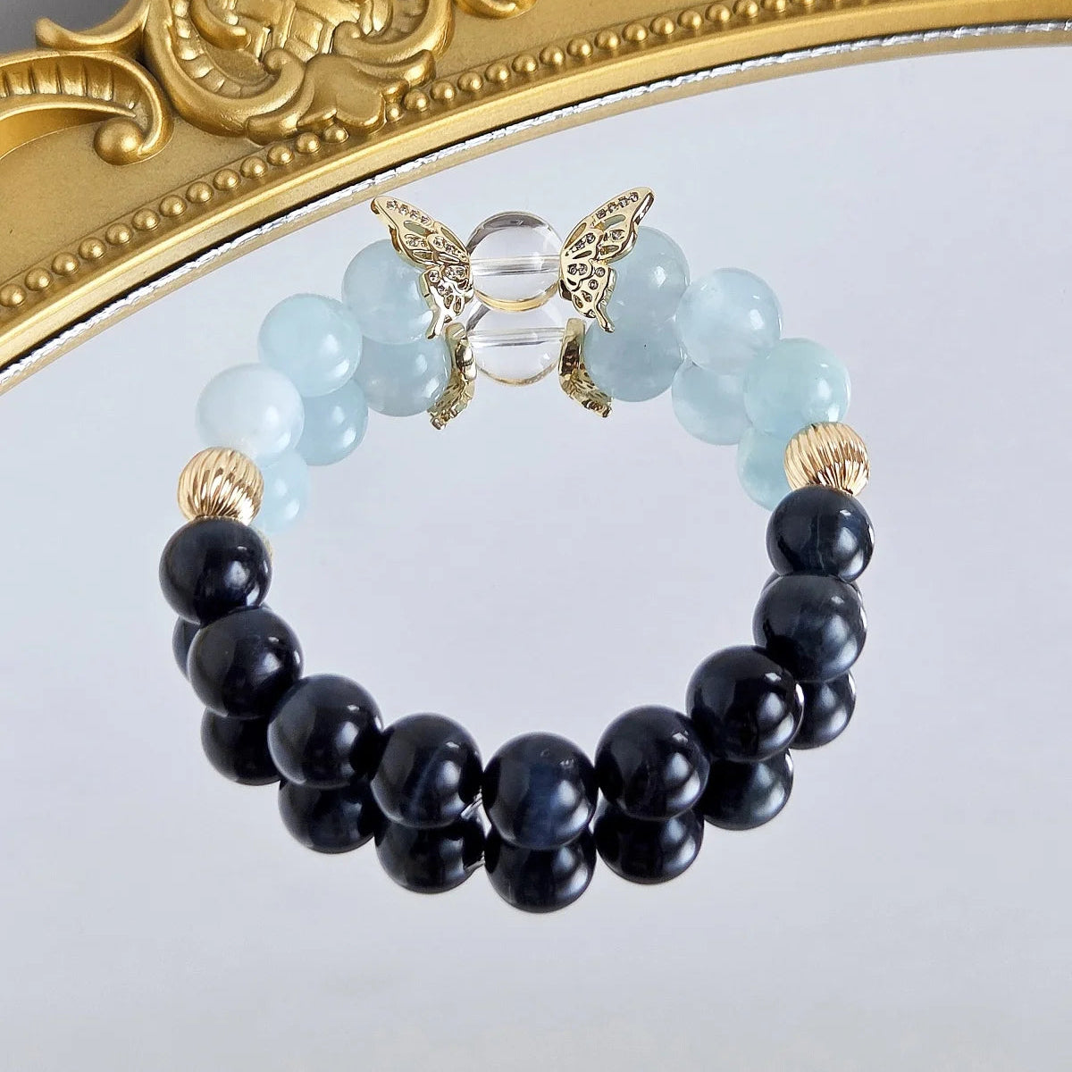 Heavenly Flight – Blue Tiger’s Eye & Aquamarine Bracelet with Golden Wing Accents