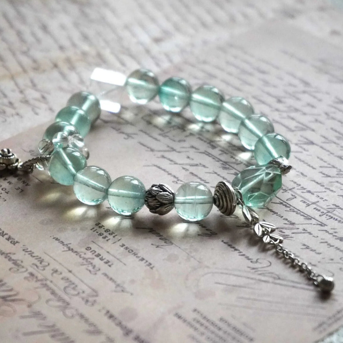 Elegant Green Fluorite and White Crystal Bracelet with Silver Rose Charm