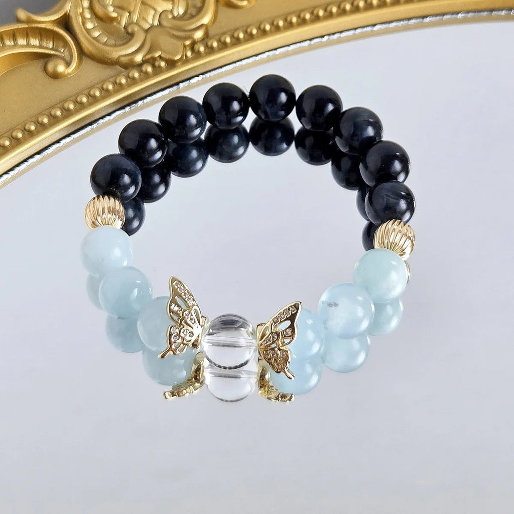Heavenly Flight – Blue Tiger’s Eye & Aquamarine Bracelet with Golden Wing Accents