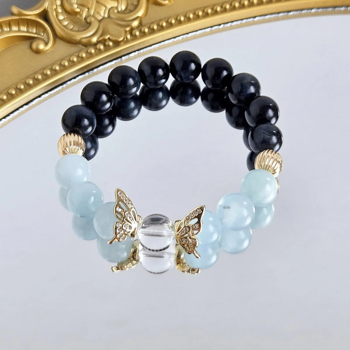 Heavenly Flight – Blue Tiger’s Eye & Aquamarine Bracelet with Golden Wing Accents
