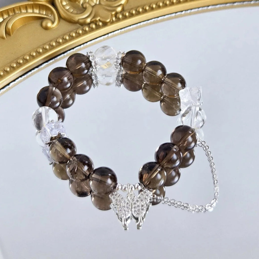 Ethereal Grace – Smoky Quartz & Clear Quartz Bracelet with Butterfly Charm