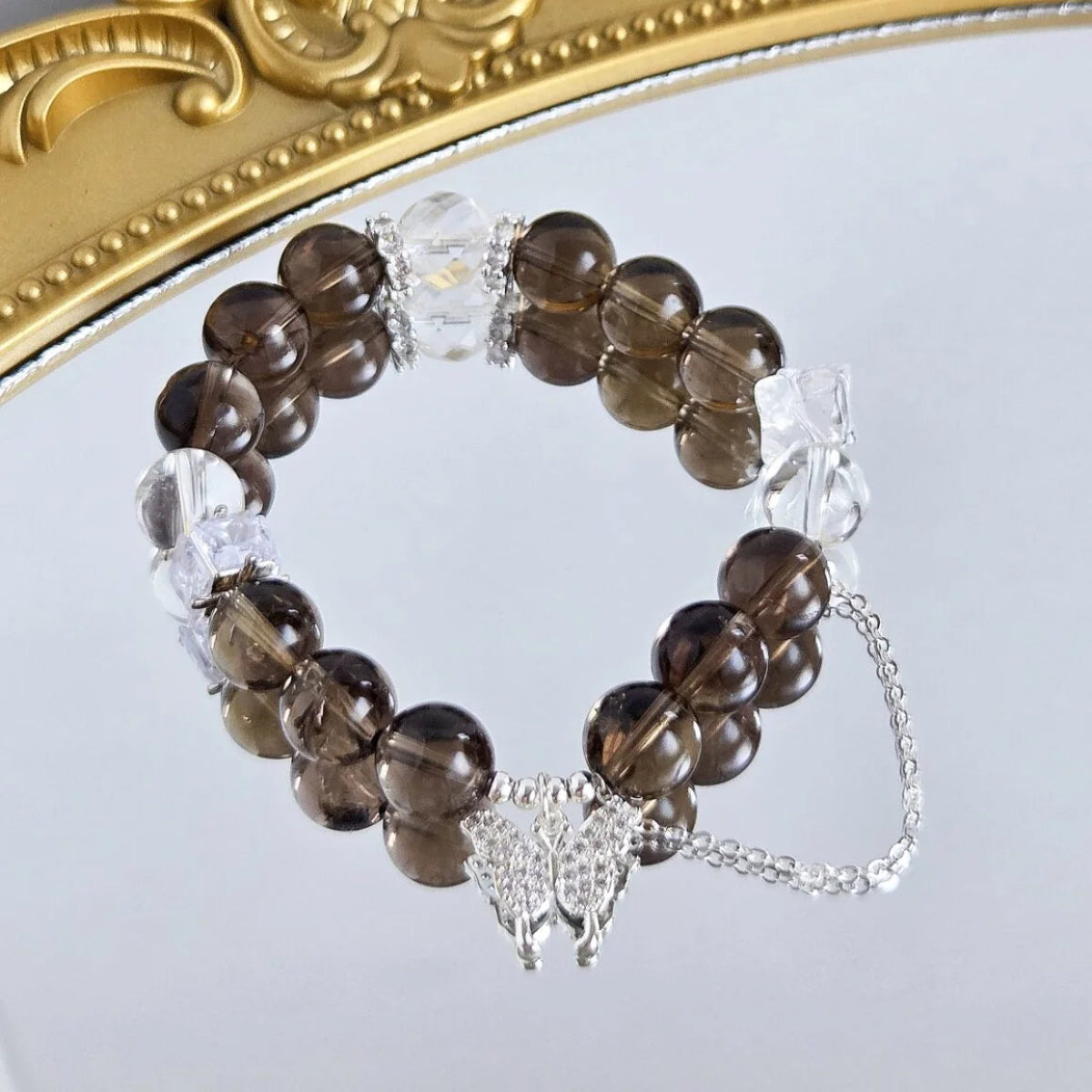 Ethereal Grace – Smoky Quartz & Clear Quartz Bracelet with Butterfly Charm