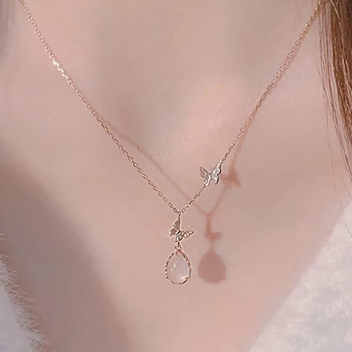 Fairy Grace – Adjustable Rose Quartz Necklace with Dancing Butterflies